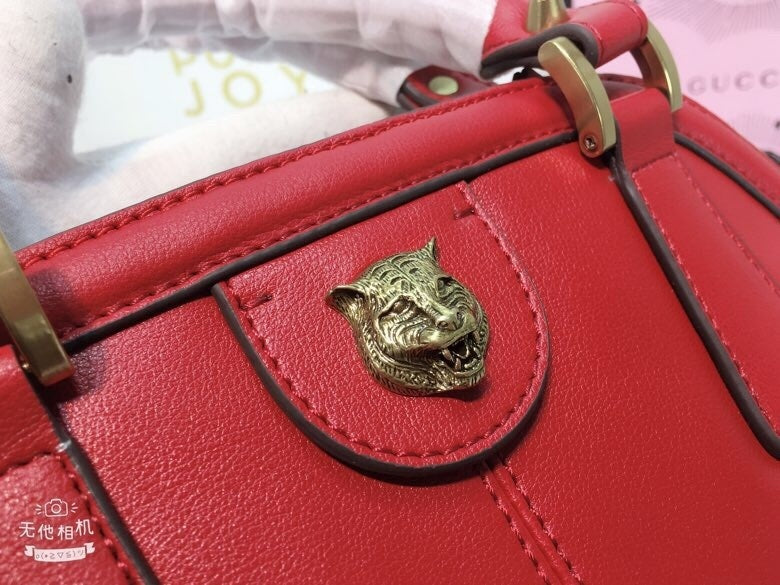 Gucci Classic Leather Dome Satchel with Top Handle and Signature Metallic Detailing