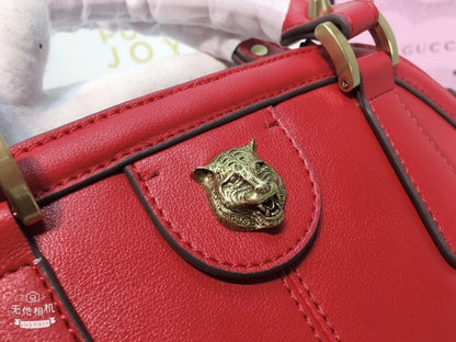 Gucci Classic Leather Dome Satchel with Top Handle and Signature Metallic Detailing