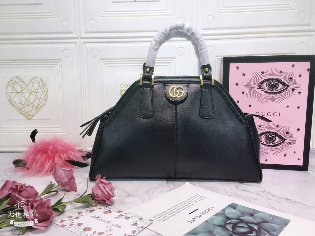 Gucci Classic Leather Dome Satchel with Top Handle and Signature Metallic Detailing