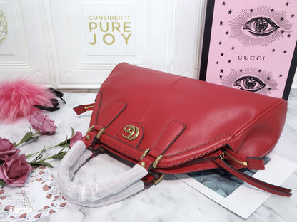 Gucci Classic Leather Dome Satchel with Top Handle and Signature Metallic Detailing