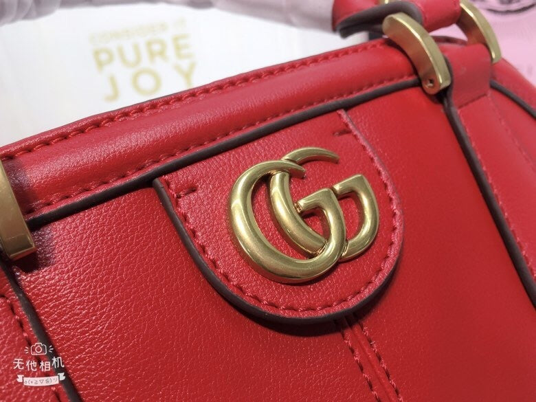 Gucci Classic Leather Dome Satchel with Top Handle and Signature Metallic Detailing