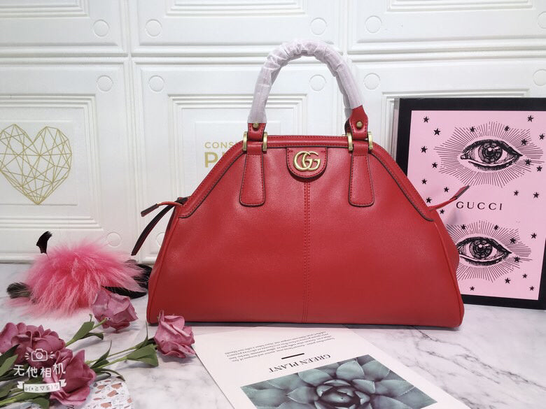 Gucci Classic Leather Dome Satchel with Top Handle and Signature Metallic Detailing