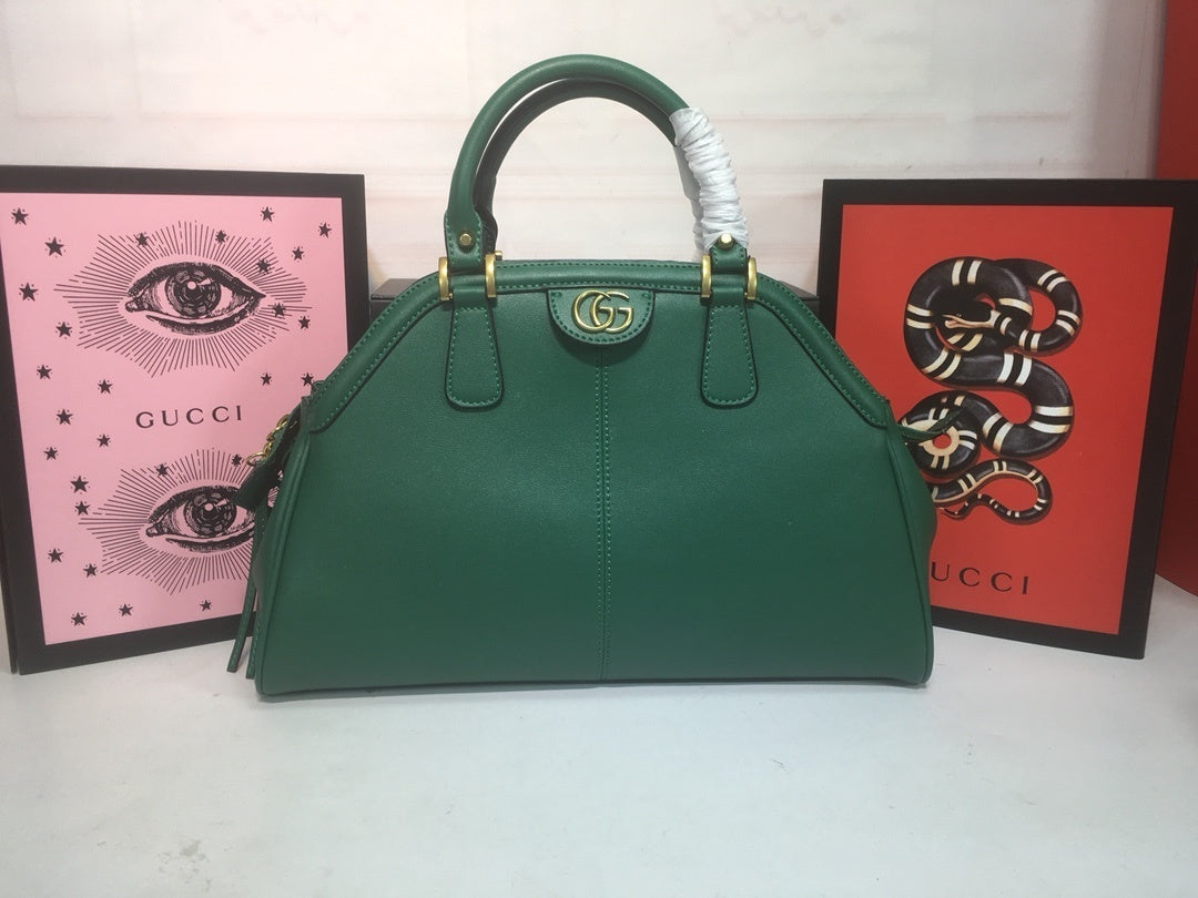Gucci Classic Leather Dome Satchel with Top Handle and Signature Metallic Detailing