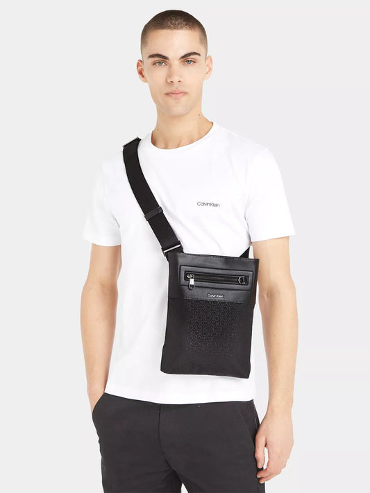 Calvin Klein Men’s Autumn/Winter Slim Crossbody Bag | Sustainable & Stylish